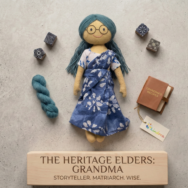 Doll in a blue dress with yarn and a book on a textured surface, featuring 'The Heritage Elders: Grandma' text.